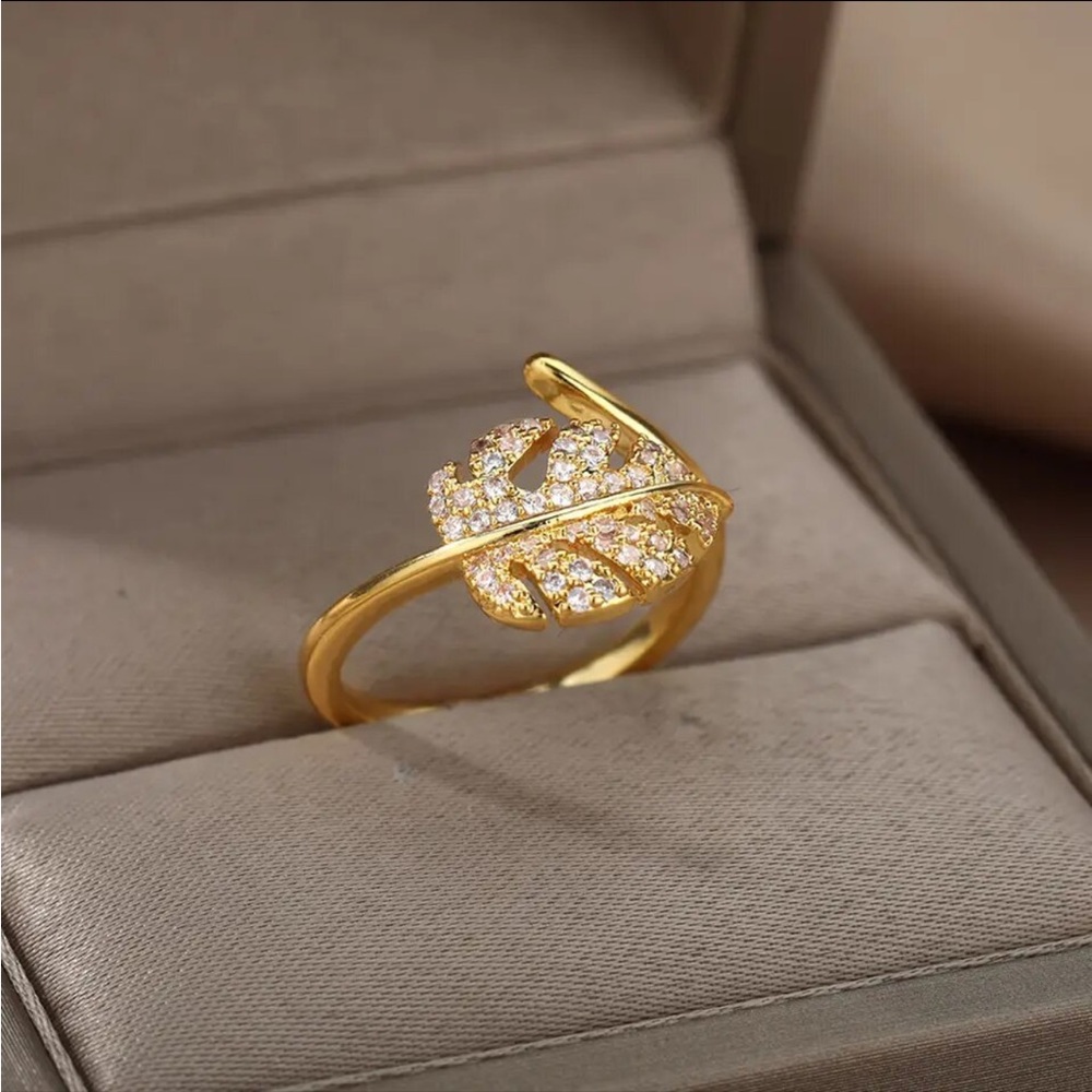Gold palm leaf ring